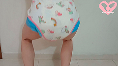 Diapered Trans girl doing Squats while Wetting her diaper